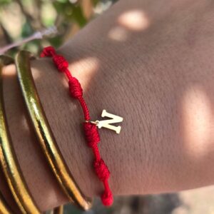 Pulsera 7 nudos inicial N oro