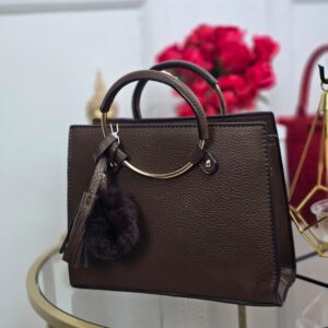 Bolso pompom chocolate