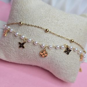 Pulsera doble perlas oro LV 108